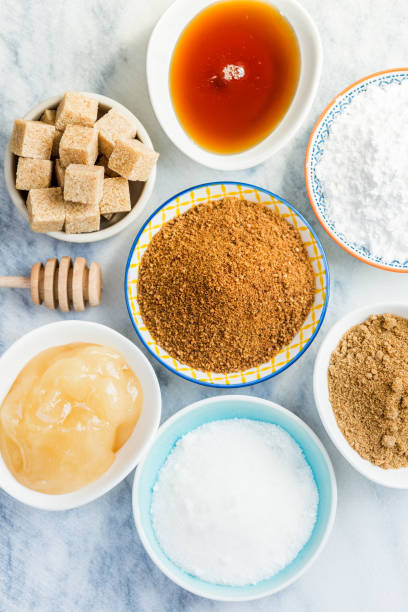 Different Kinds of Sugar and Sweeteners in the Bowls stock photo