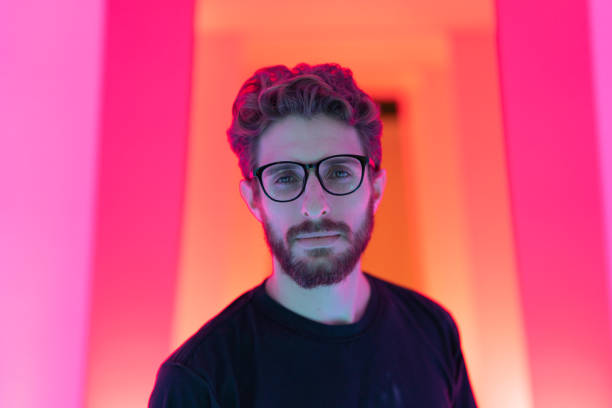 Portrait of a Beautiful Man at Colored Tunnel
