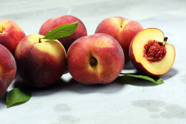 istock A group of ripe peaches on table 1008439866
