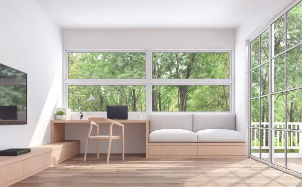 Modern living room and working corner with nature view 3d render.The room has wooden floor and white wall.furnished with wood furniture.There are large windows look out to see the nature