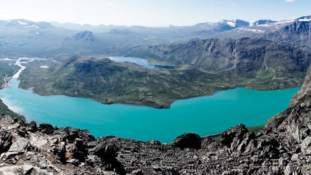 Beseggen mountain ridge in Jotunheimen, Norway with blue sky and clouds stock photo