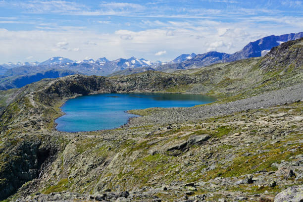 Beseggen mountain ridge in Jotunheimen, Norway with blue sky and clouds stock photo