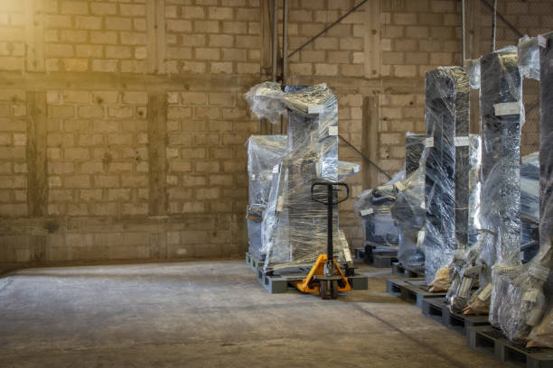 istock Old warehouses with pallets and some storage. 1008454228