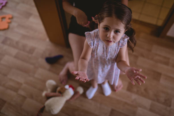 istock Mother making her daughter's hair 1008494406