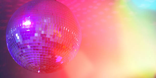Dance floor Disco ball in a nightclub with colorful lights. disco lights stock pictures, royalty-free photos & images