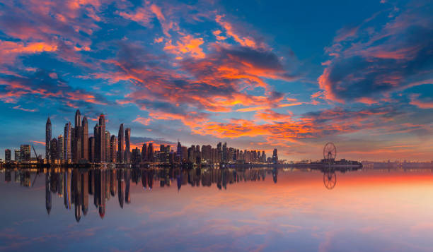 istock Panorama of Dubai Marina skyline at sunset with a beautiful dramatic sky 1008512630