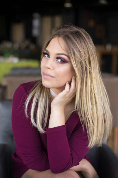 Portrait of a beautiful young woman. About 20 years old, Caucasian blonde.
