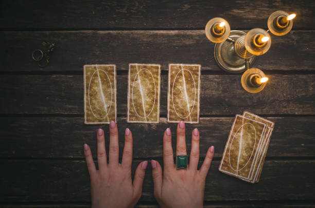 Tarot cards. Tarot cards on fortune teller desk table background. Futune reading concept. Divination. runes photos stock pictures, royalty-free photos & images