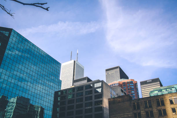 Picture of Skyscrapers reflecting in each other in the Toronto skyline, in Ontario, Canada. Toronto, the capital of the province of Ontario, is a major Canadian city and one of the main business centers in America