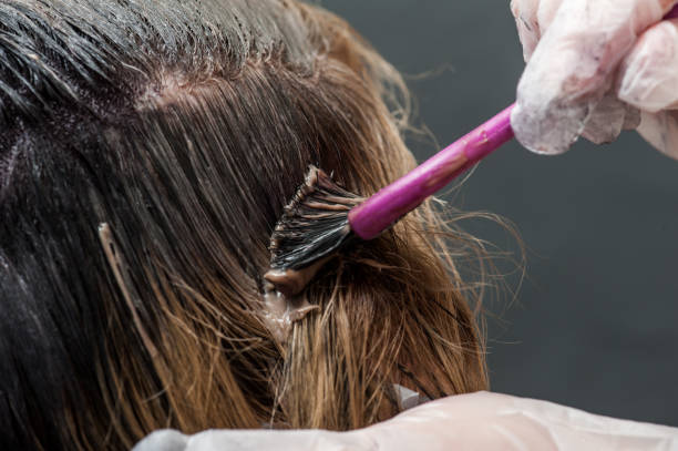 istock Dying blond hair to black 1008525010