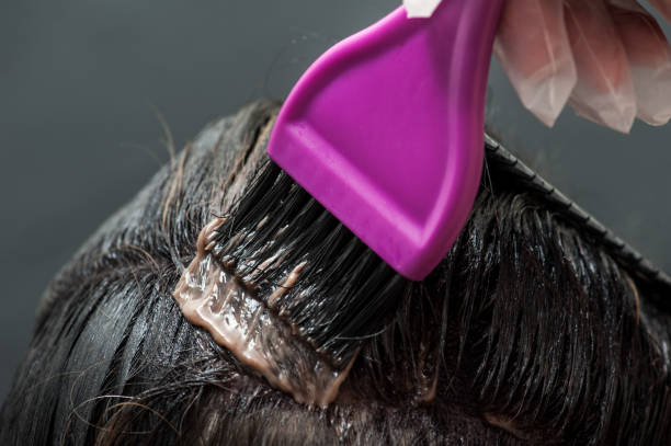istock Dying blond hair to black 1008525514