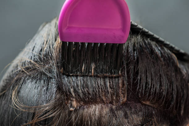 istock Dying blond hair to black 1008525568