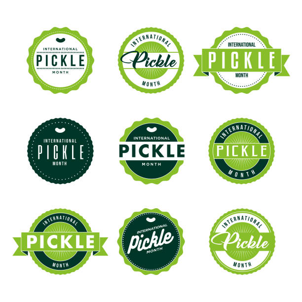 International Pickle Month Labels Icon Set A set of event labels in a variety of typographic styles. Color swatches are global for quick and easy color changes throughout the file. The color space is CMYK for optimal printing and can easily be converted to RGB for screen use. dill pickle stock illustrations