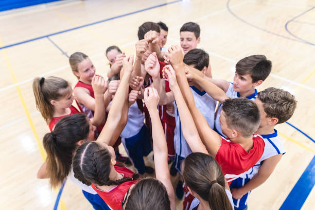 istock Co-ed high school basketball 1008556988