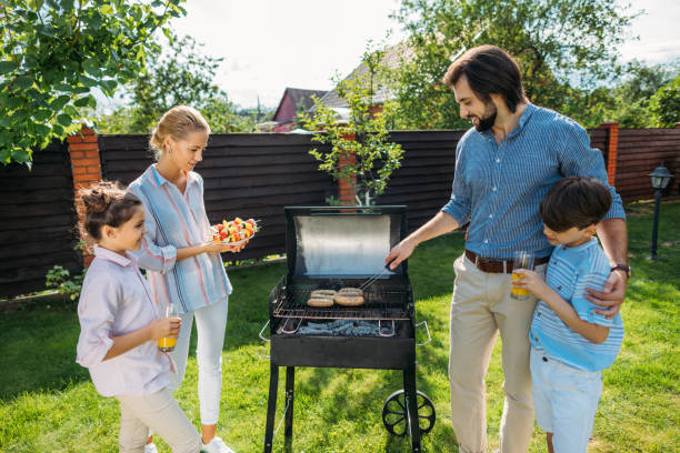 istock family having barbecue together on backyard on summer day 1008570592