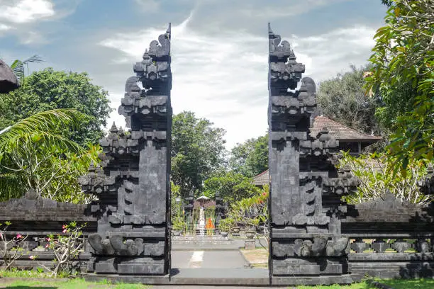 Photo of Pura Goa Lawah Temple. Bat cave in Bali, Indonesia
