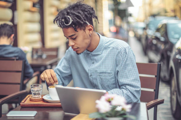 istock Young businessman in a coffee shopp 1008574112