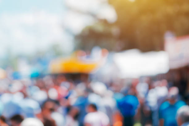 istock Abstract blur people crowd walking on street 1008574582