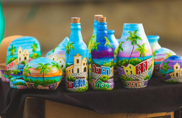 Olinda, Pernambuco, Brazil - January 29, 2018: Brazilian craftsmen paint on ceramics and sell souvenirs on the streets in Olinda city in Pernambuco.