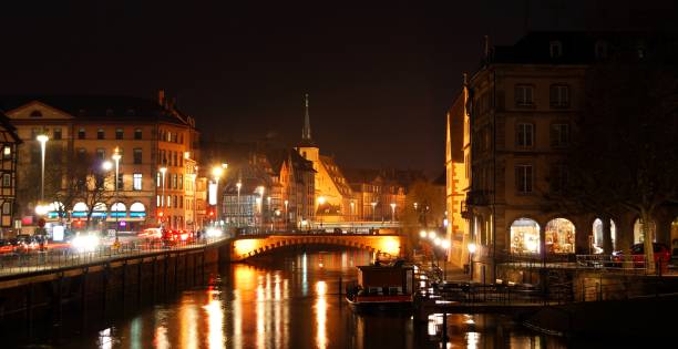 istock water chanel and streets in Strasbourg at night 1008600250
