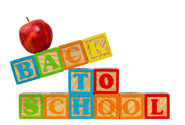 istock Back to School spelled out in wooden blocks with apple 1008608646