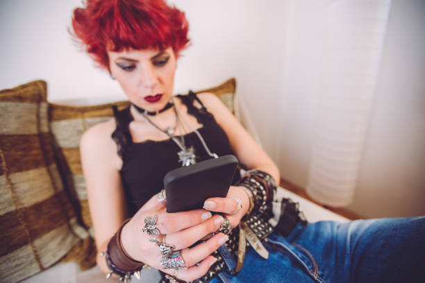 istock Metal girl texting over phone 1008633344
