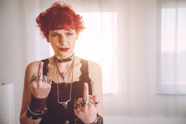 istock Metal girl showing middle finger gesture 1008633378
