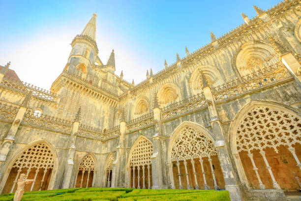 Gothic Batalha Monastery Portugal, Batalha. Gothic towers and arches of Dominican convent of Batalha Monastery, one of the best examples of Gothic architecture in Portugal, mixed with the Manueline style. Unesco Heritage. batalha abbey photos stock pictures, royalty-free photos & images