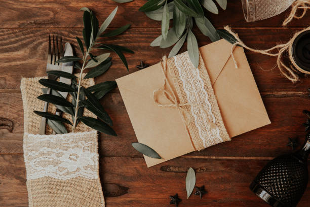 istock Rustic wedding invitation card. bridal dinner concept styled with wedding accessories. 1008645990