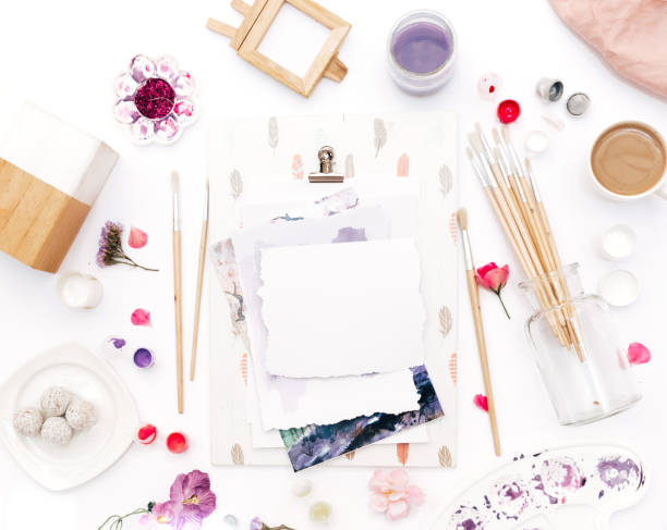 istock Art workspace.Flat lay brushes, paints, palette of watercolor on a white background 1008646146