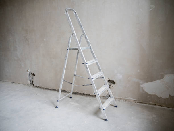 istock The stepladder for repair stands in the room 1008653348