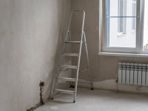 istock The stepladder for repair stands in the room 1008653370