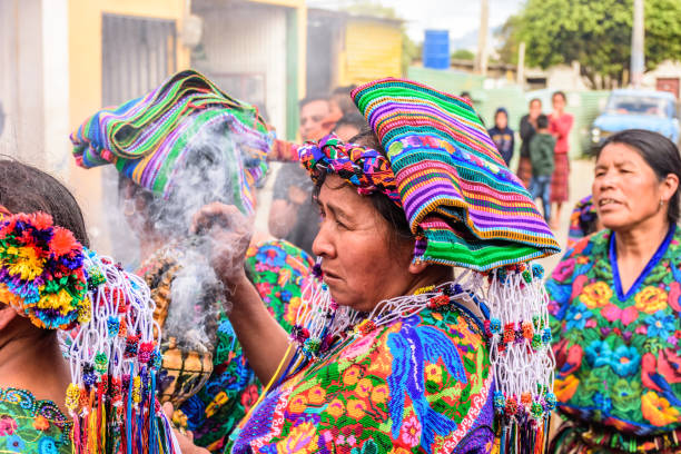 Indigenous women dressed in ceremonial headdresses & costumes, Guatemala stock photo