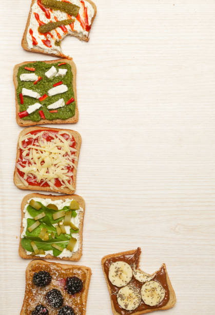 istock Top view of six open sandwiches on the table 1008670400
