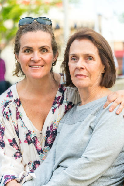 istock Senior woman posing with her mature daughter 1008697696