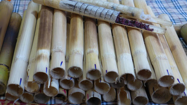 istock Thai Dessert, Sticky rice roasted in bamboo joints 1008700428