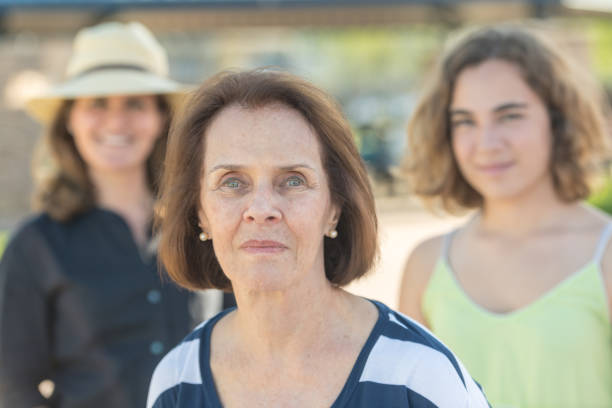 istock Senior woman posing with her mature daughters 1008700514