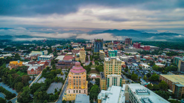 Drone Aerial of Downtown Asheville North Carolina Skyline Drone Aerial of Downtown Asheville North Carolina NC Skyline blue ridge mountains photos stock pictures, royalty-free photos & images