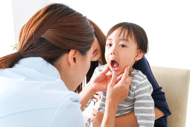 Dentist and Child Dentist and Child pediatric dentistry stock pictures, royalty-free photos & images