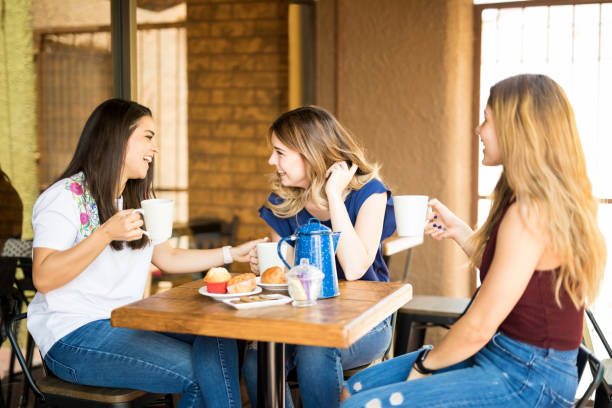 istock Group of friends hanging out at cafe 1008749082