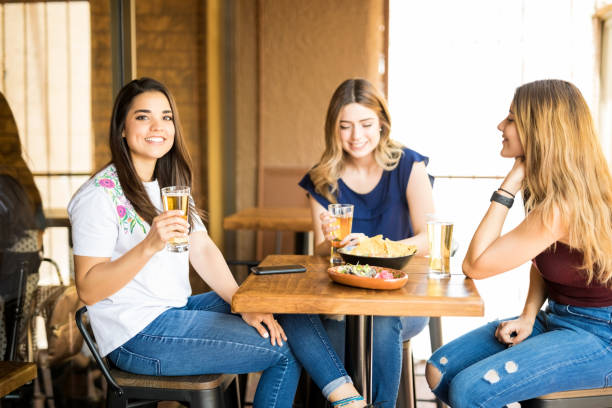 istock Group of friends having beers at restaurant 1008749110