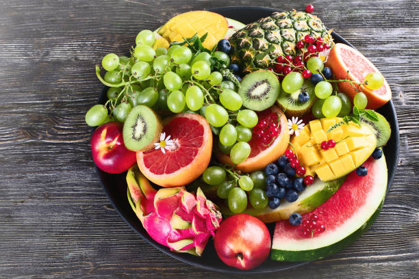 istock Fresh  fruits and berries platter 1008755612