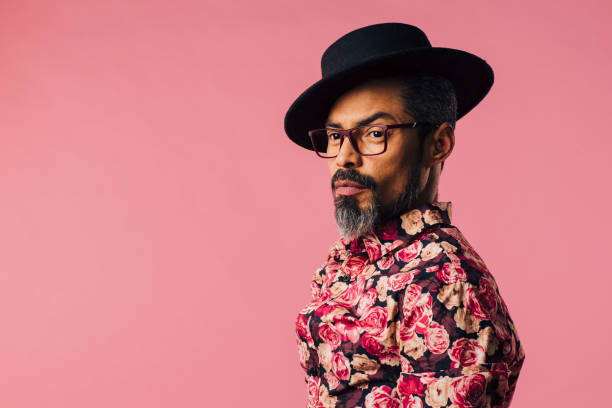 istock Portrait of a very cool man with tilted hat looking off camera 1008783598