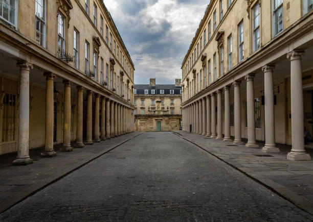 istock Gorgeous deserted street in Bath, England with Georgian columns 1008786380