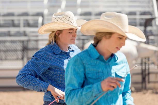 istock Young Women Prepare for Goat Roping Competition 1008786424
