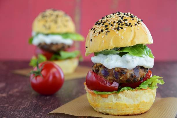 istock Sesame bread bun with lentil rice patty burger 1008799364