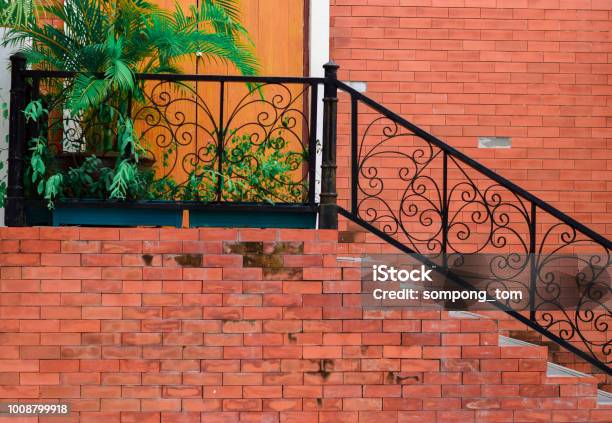 Old Architecture Staircase And Tree The Brick Wall Is Brown Stock Photo - Download Image Now