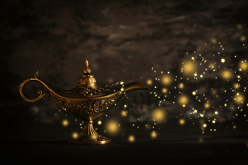 Image Of Magical Mysterious Aladdin Lamp With Glitter Sparkle Lights Over  Black Background Lamp Of Wishes Stock Photo - Download Image Now - iStock