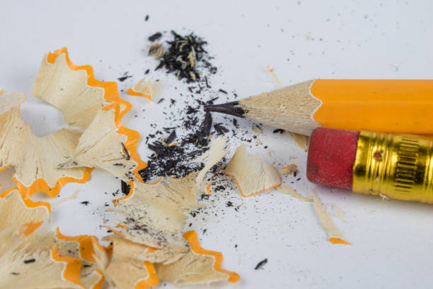 istock Pencil and sharpener on a white table. Accessories for drawing and sketching. White background. 1008812790