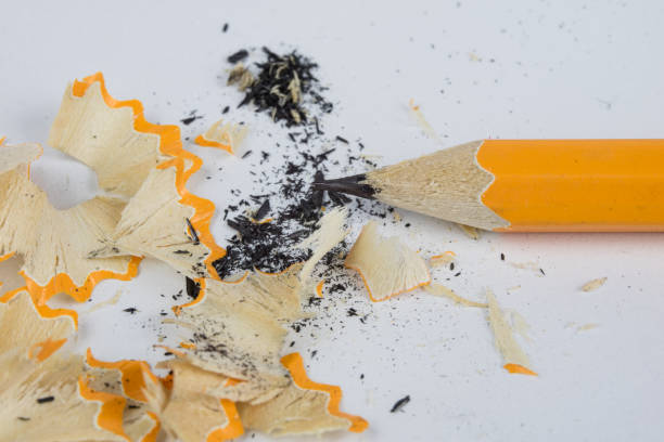 istock Pencil and sharpener on a white table. Accessories for drawing and sketching. White background. 1008812990